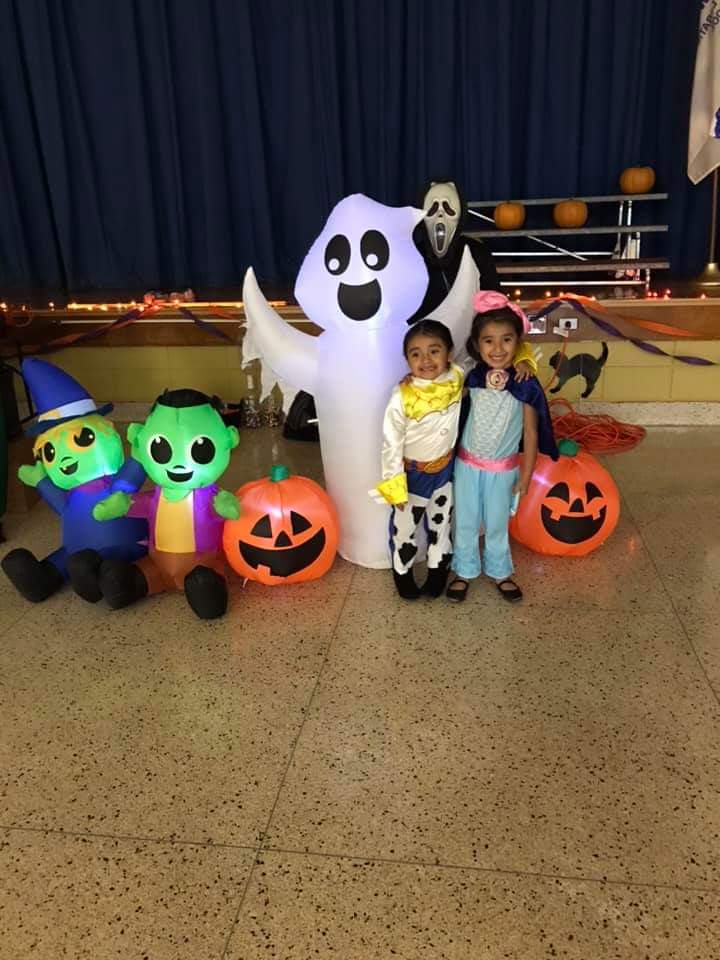 Students pose for a photo in their costumes.