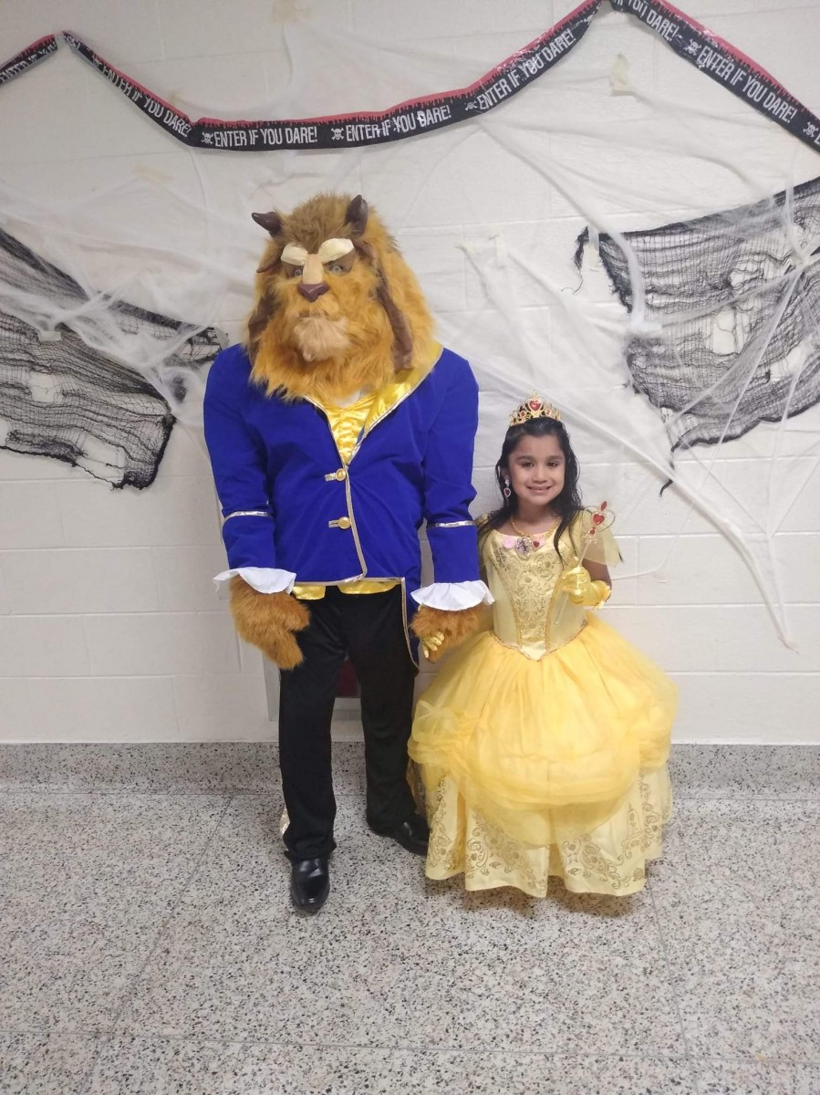 Students pose for a photo in their costumes.