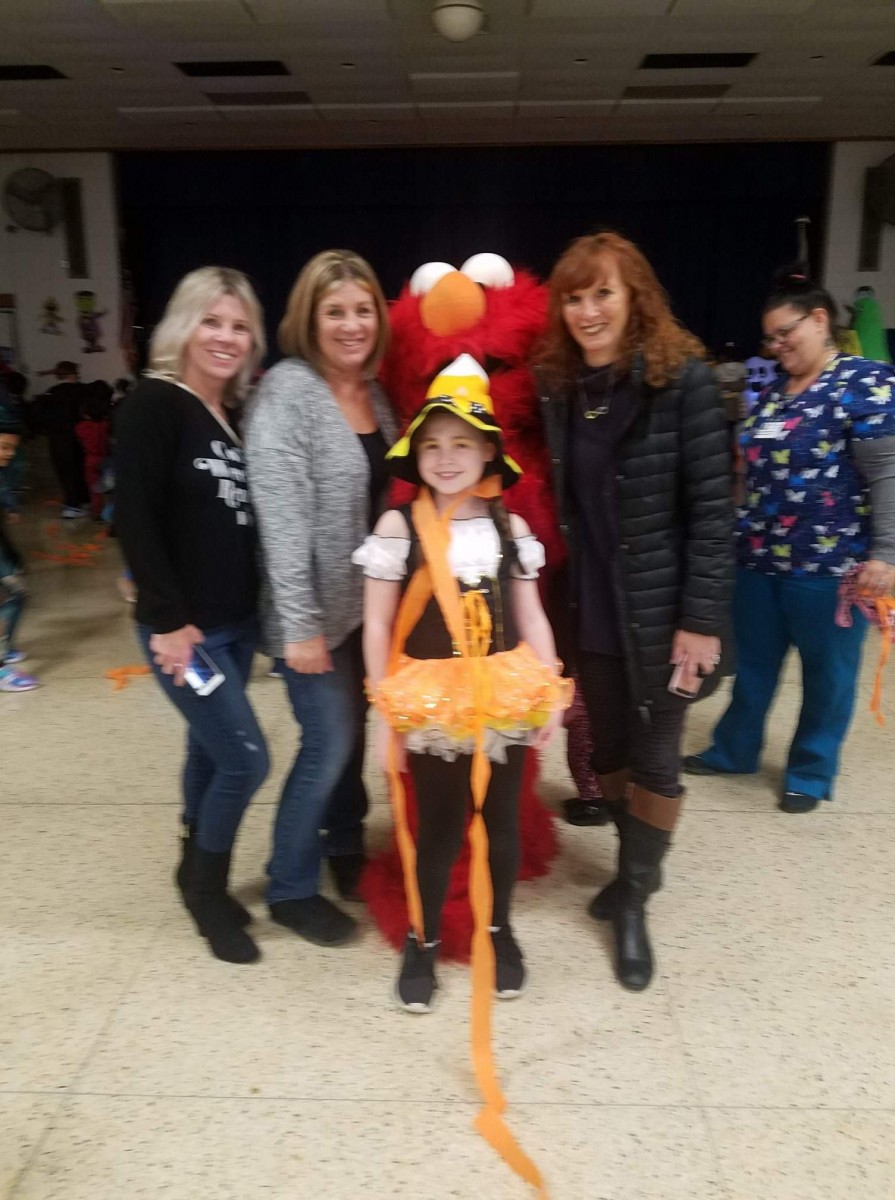 Students pose for a photo in their costumes.