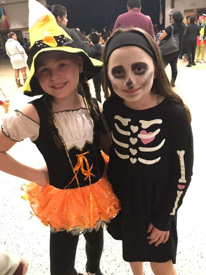 Students pose for a photo in their costumes.
