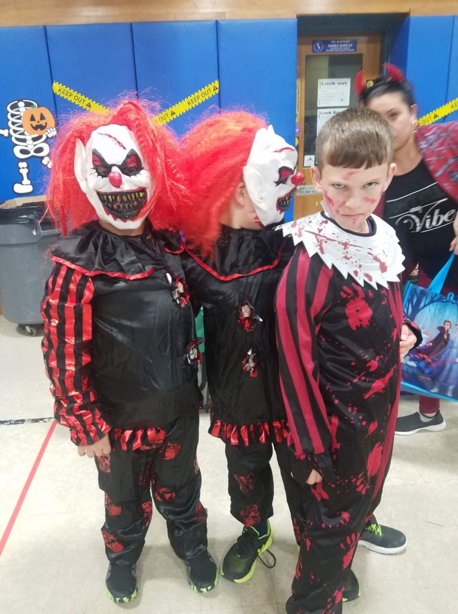 Students pose for a photo in their costumes.