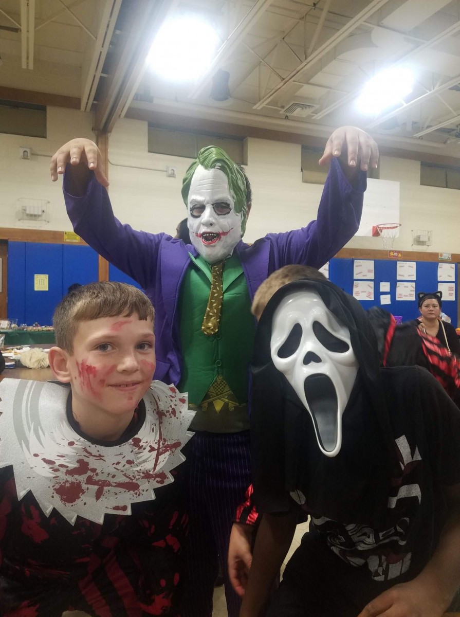 Students pose for a photo in their costumes.