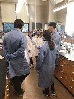 Students gathered in group in lab