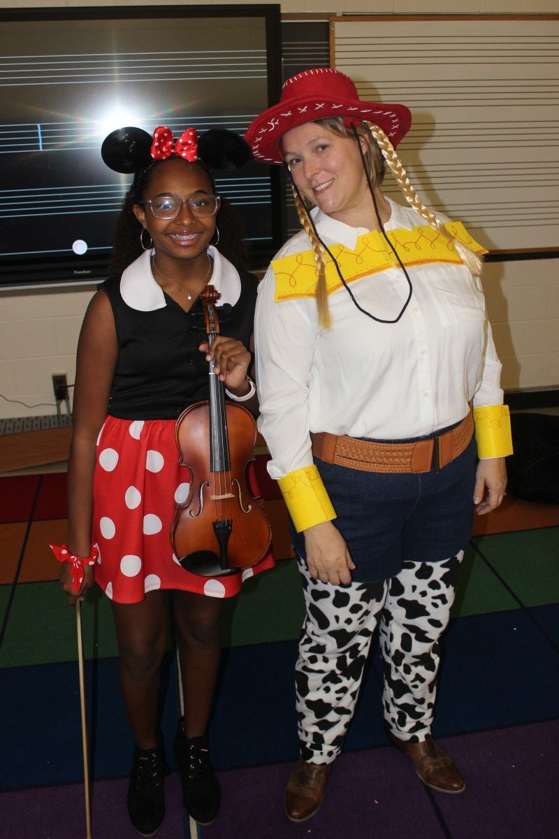 Students pose in costume.