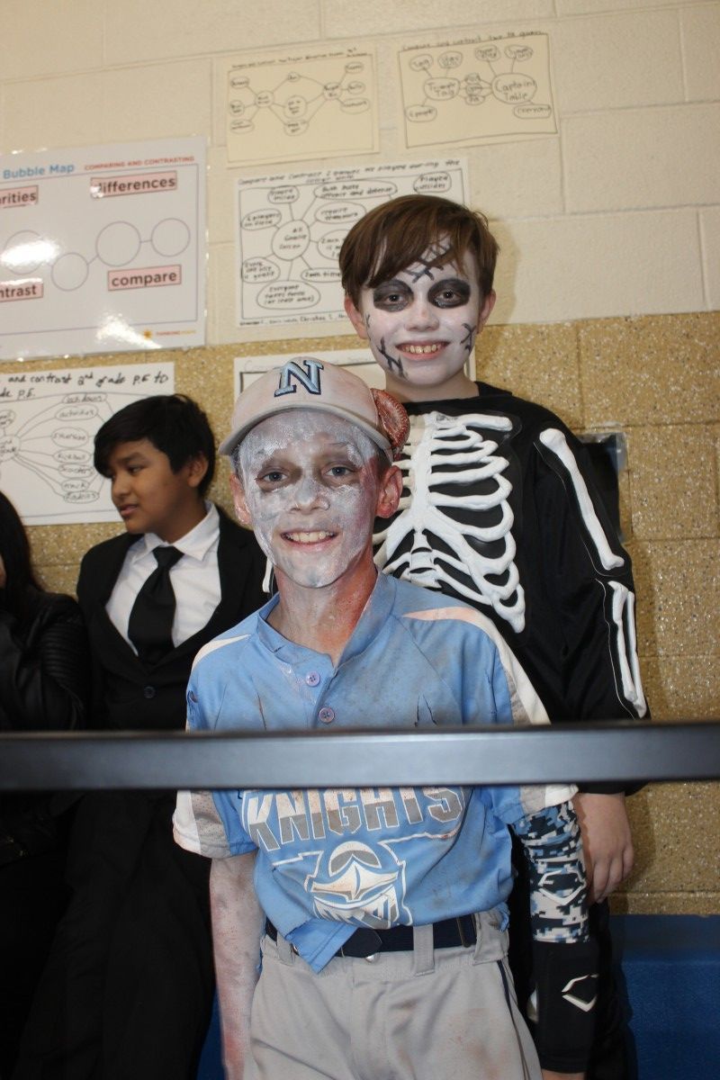 Students pose in costume.