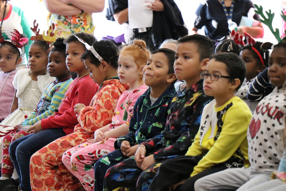 Students watch performance.