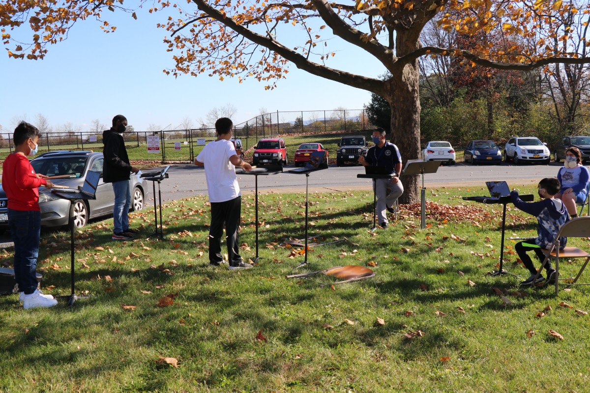 Students practicing instruments.