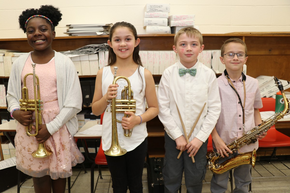 Students pose with their instruments.