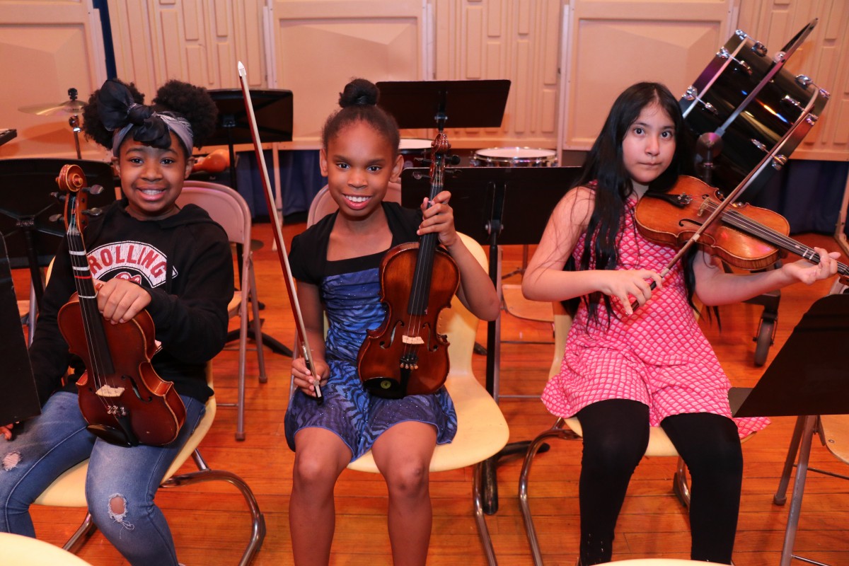 Students pose with their instruments.