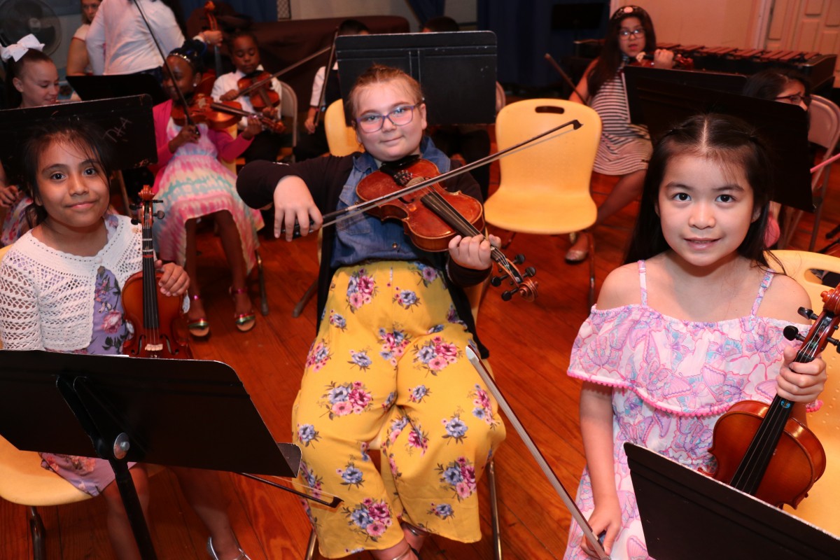 Students pose with their instruments.