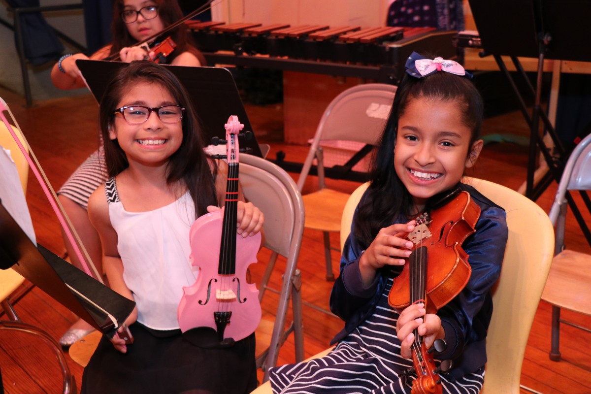 Students pose with their instruments.