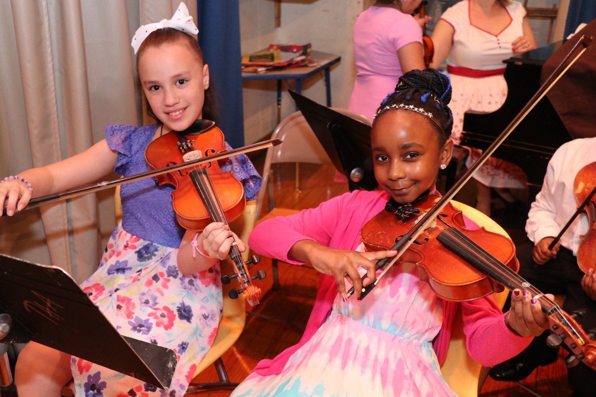 Students pose with their instruments.