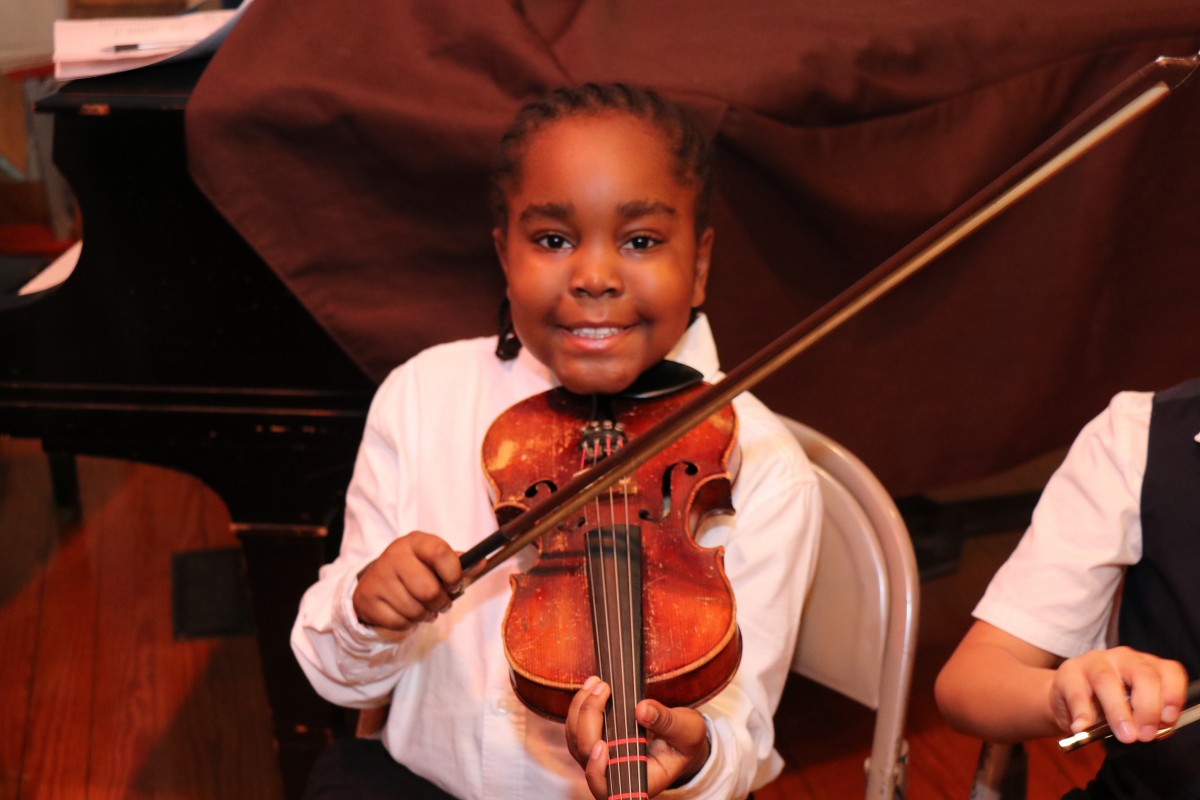 Students pose with their instruments.