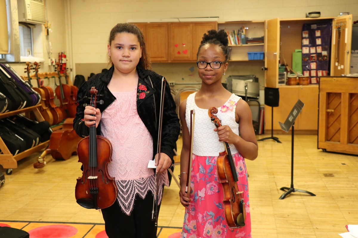 Students pose with their instruments.