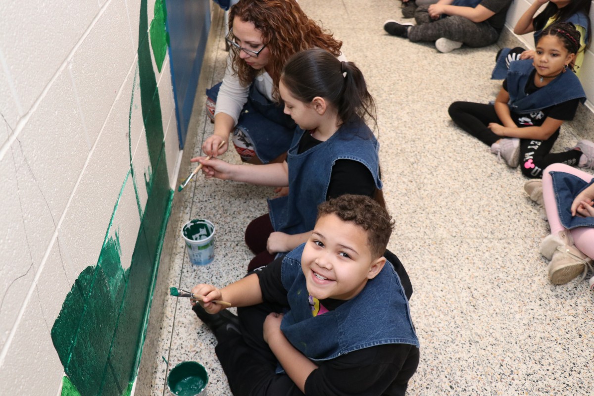 Students painting.