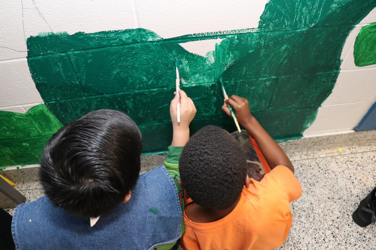 Students painting.