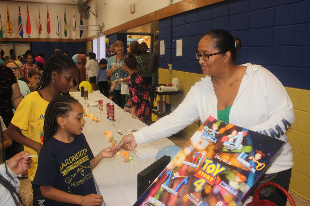 Student receives a prize.