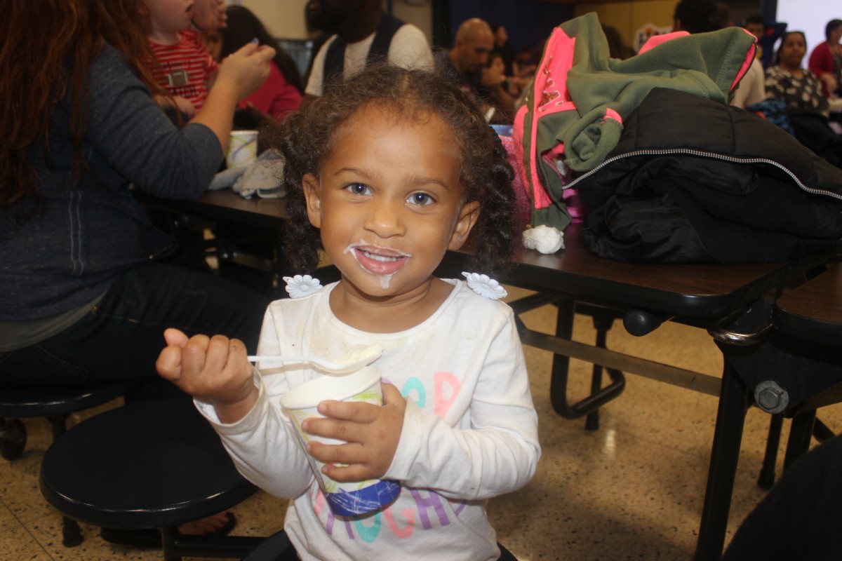 Student enjoys ice cream.