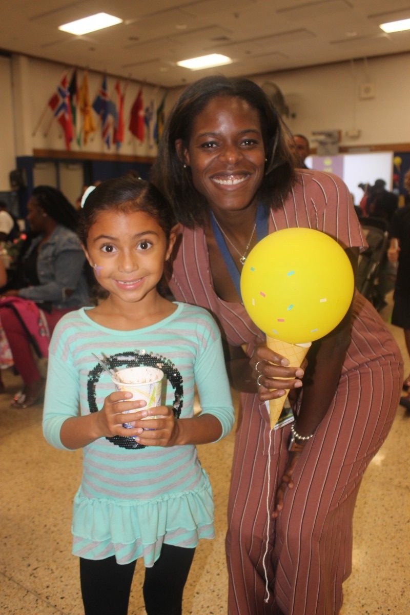 Students and principal pose for a photo.