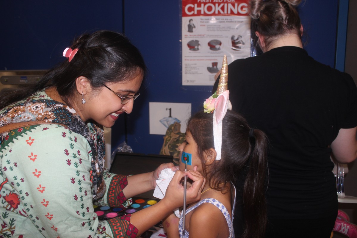 Student getting her face painted.