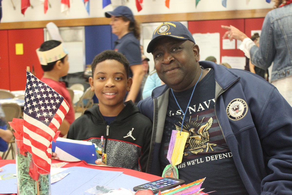 Student poses with Veteran