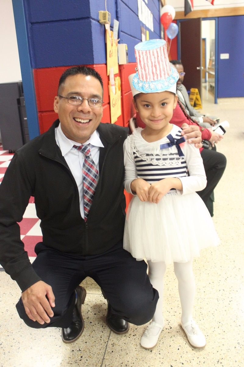 Student poses with her Principal