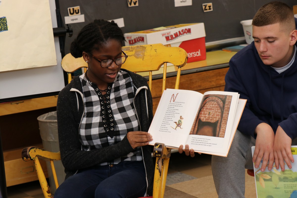 High school scholars read to first grade scholars.