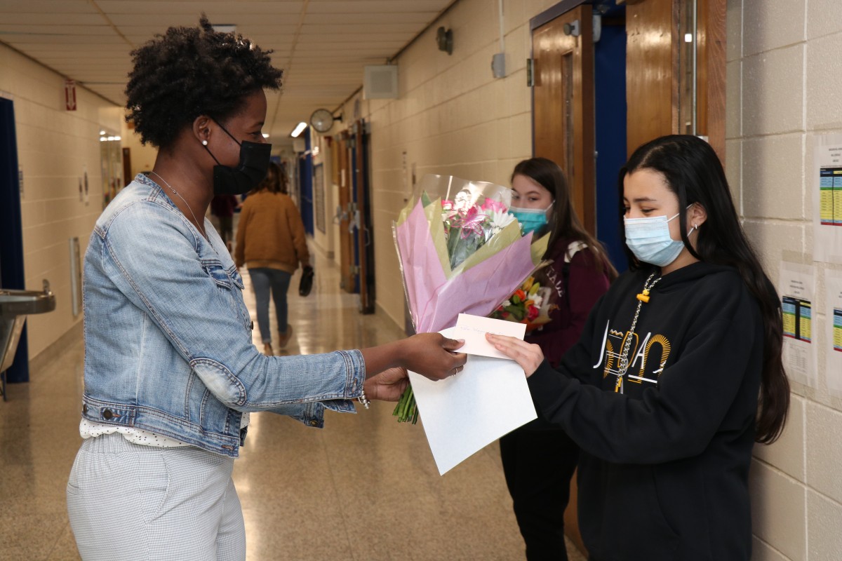 Student receiving award.