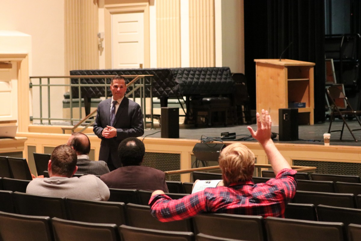 Molinaro answering questions from the audience.