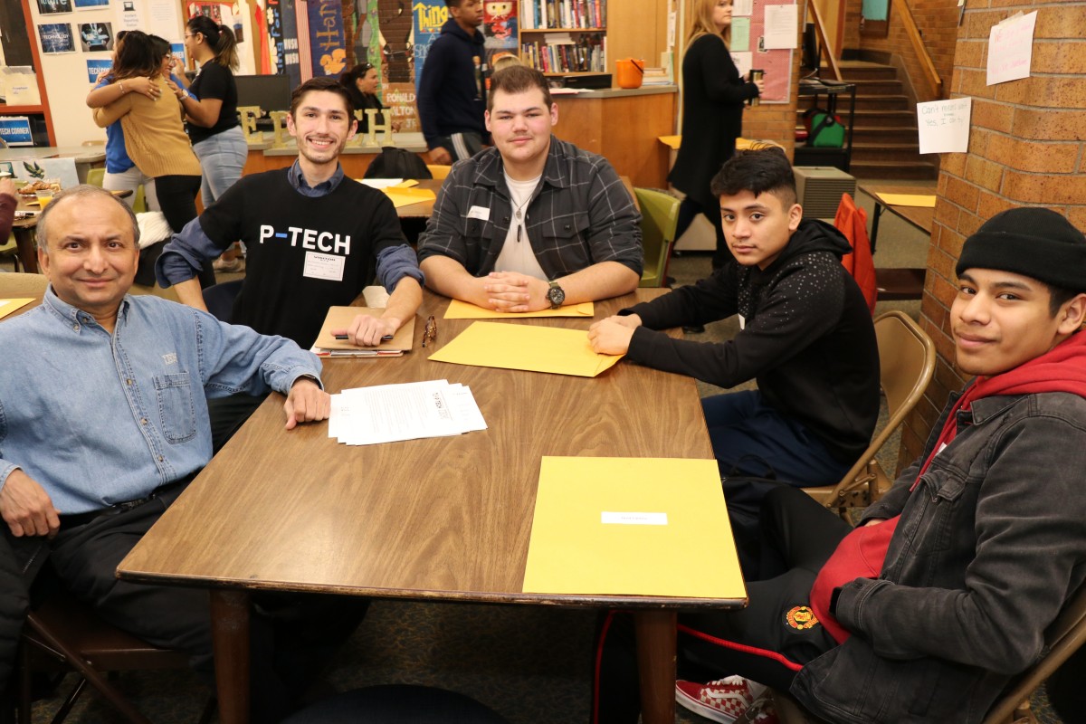 Students and mentors pose for a photo.