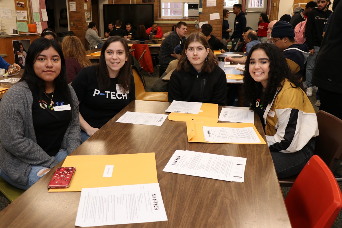 Students and mentor pose for a photo.