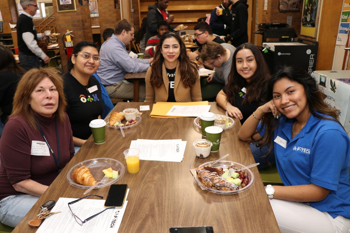 Students and mentors pose for a photo.