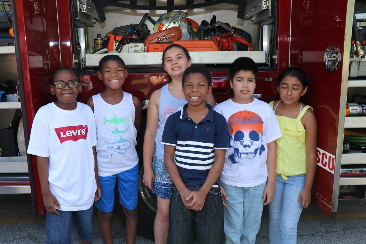 Students in front of the fire truck.