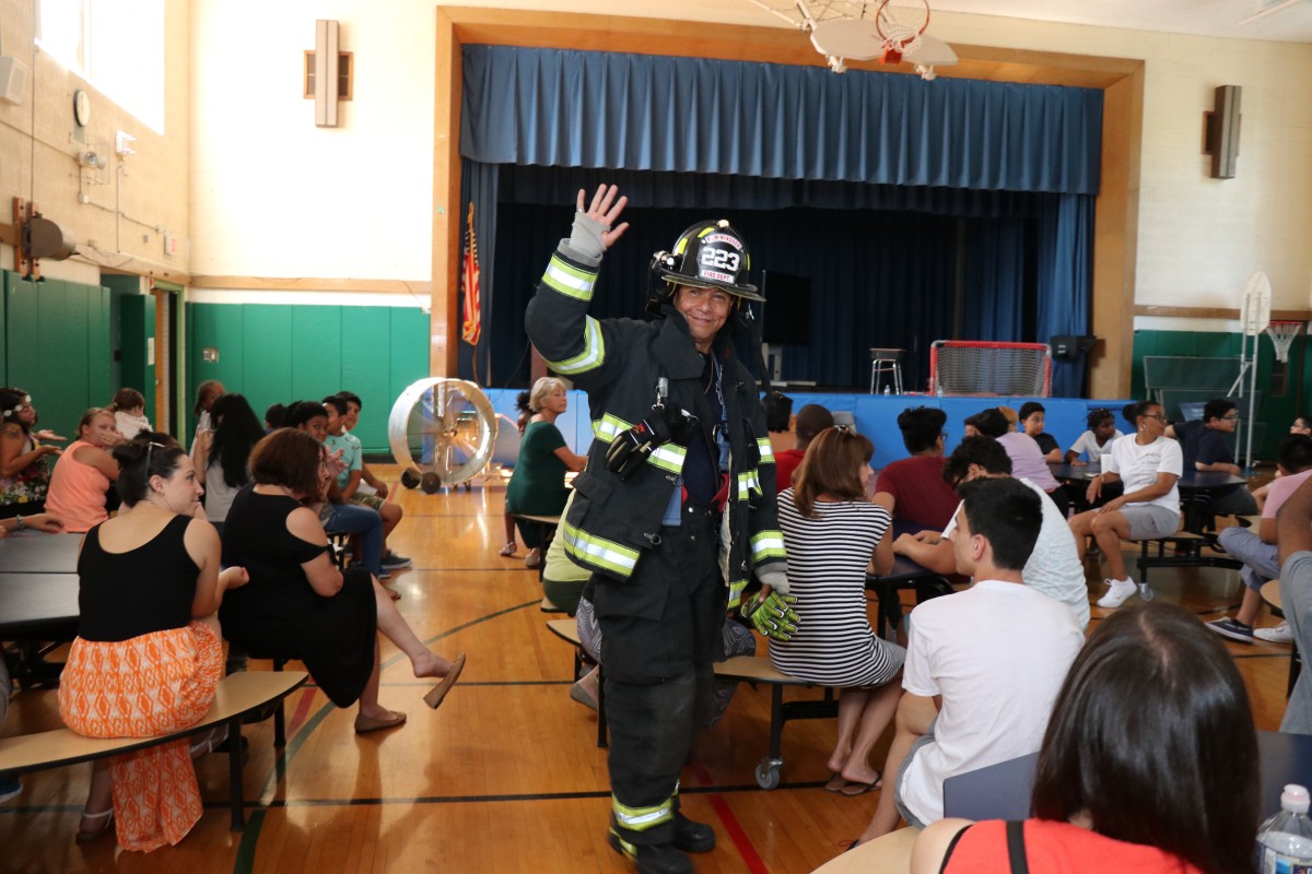 Students learn about fire prevention and fire gear.