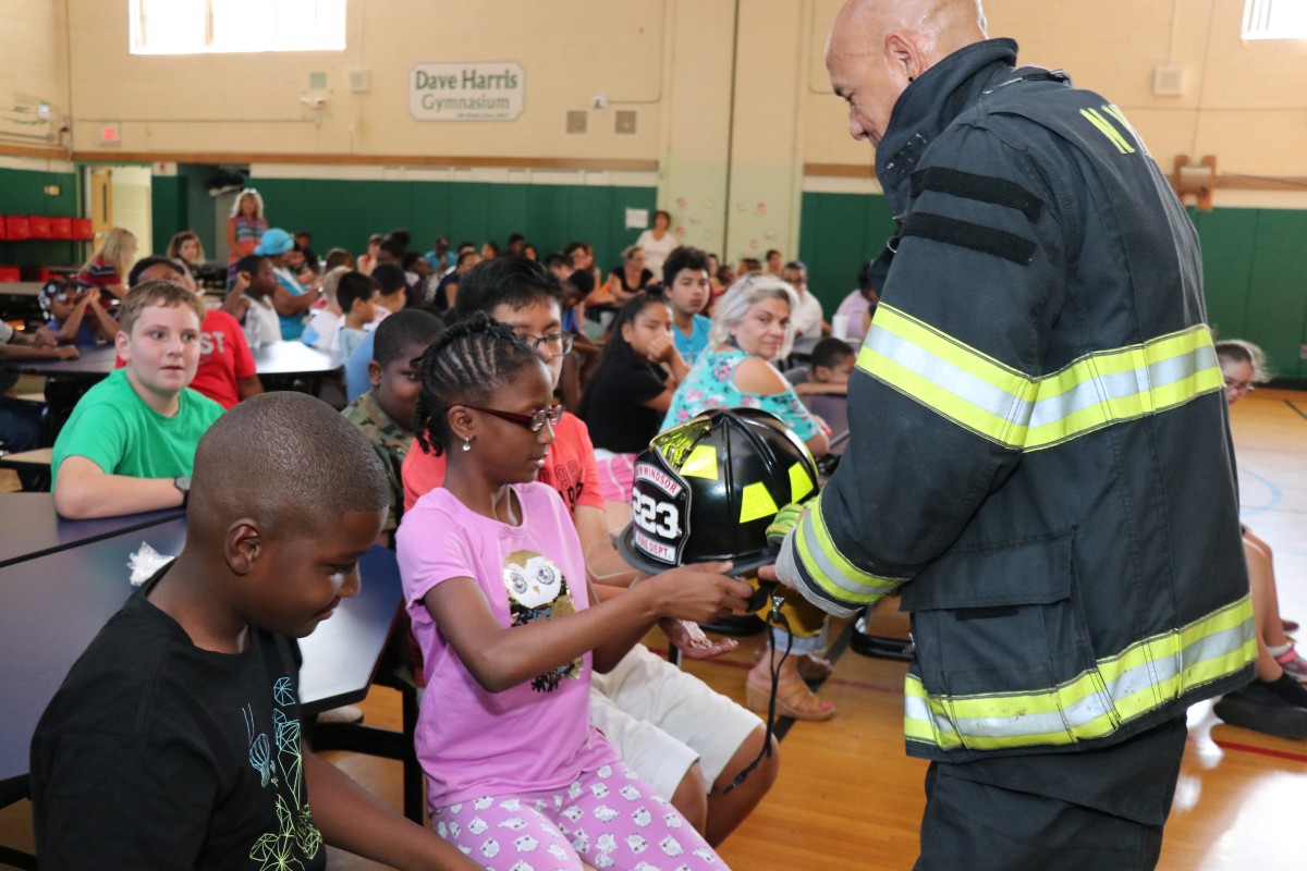 Students learn about fire prevention and fire gear.