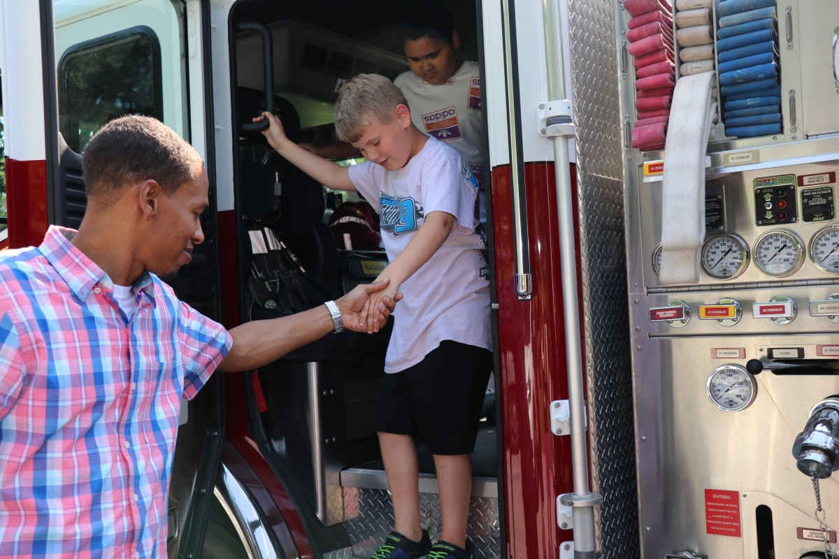 Students learn about the truck.