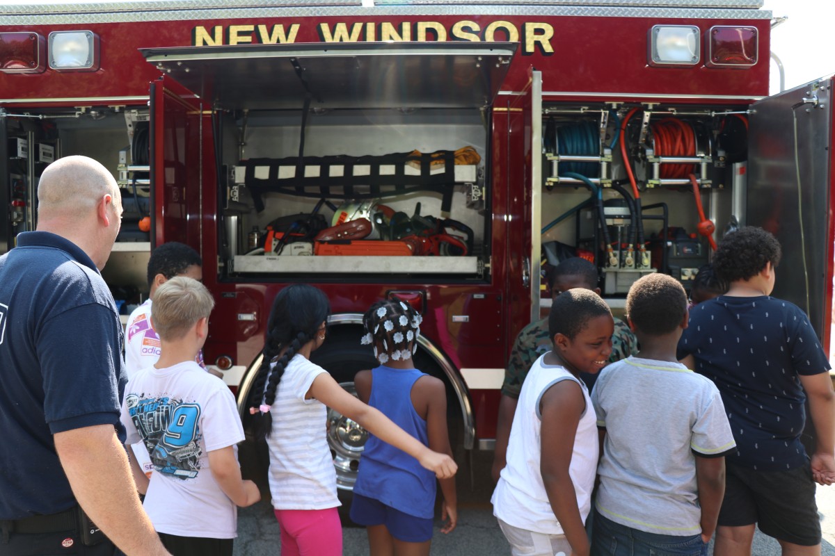 Students learn about the truck.