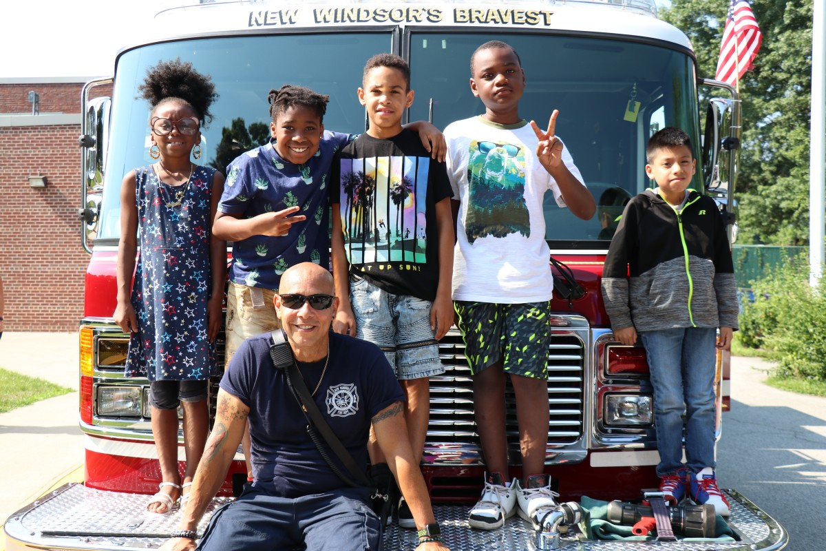 Students in front of the fire truck.