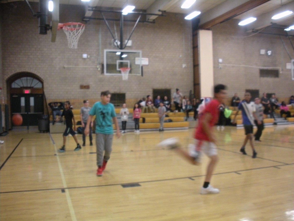 Students participate in 3 on 3 basketball tournament to raise funds for student activities