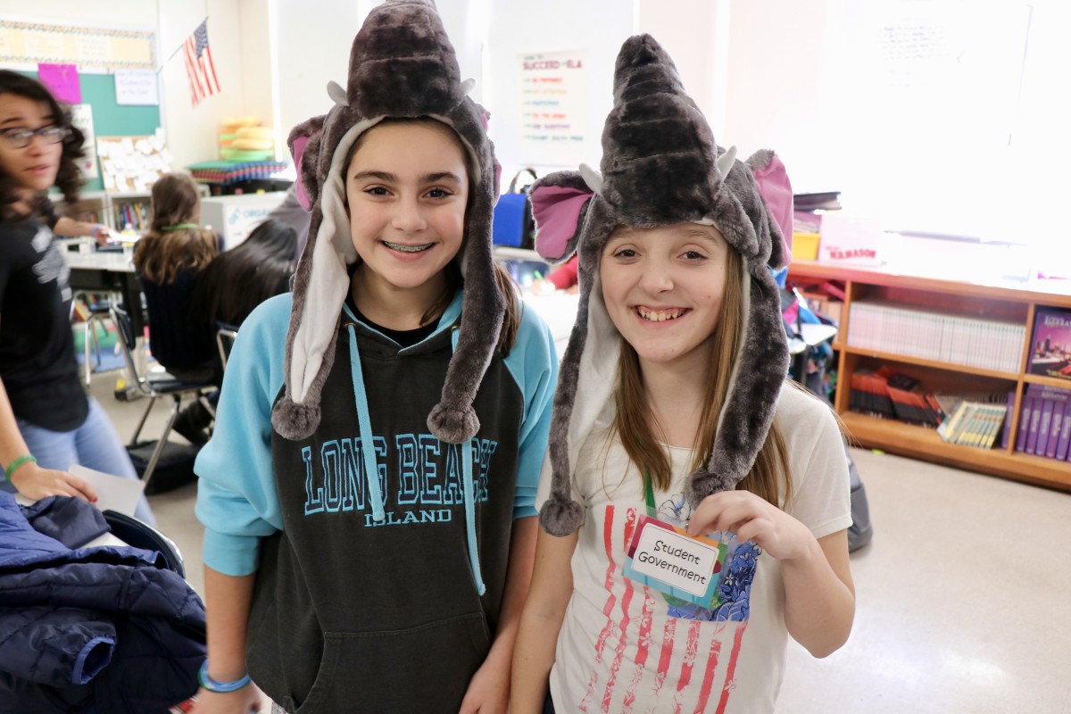 Students wearing elephant hats