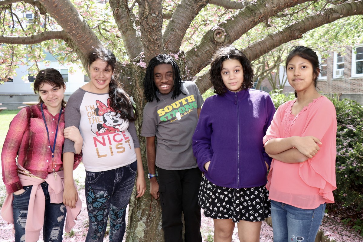 A group of students pose for the camera.