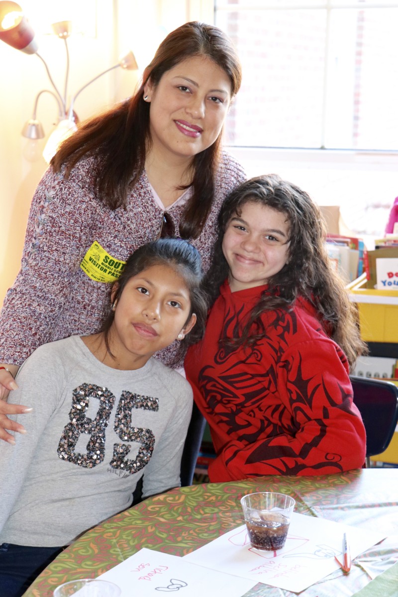 Mom and student pose for a picture