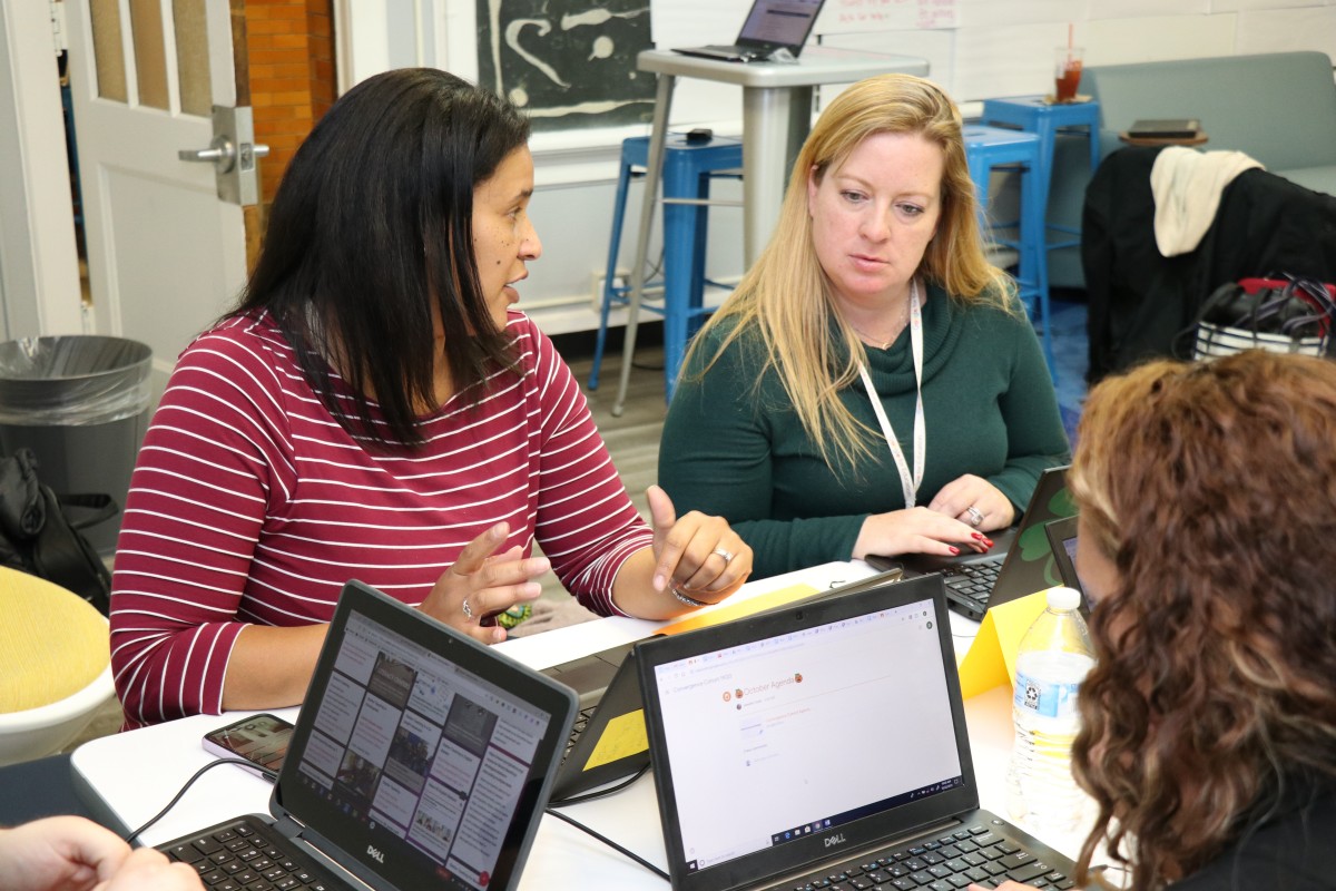 Teachers engage in professional development exercises.