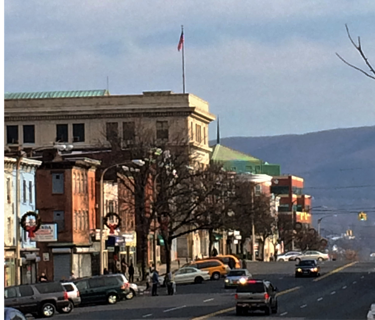 Karpeles building with flag on top.