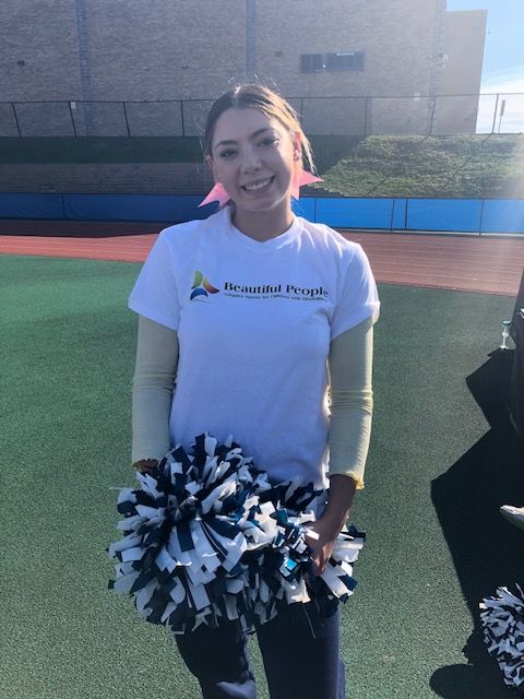 NFA Cheerleader poses for a photo.