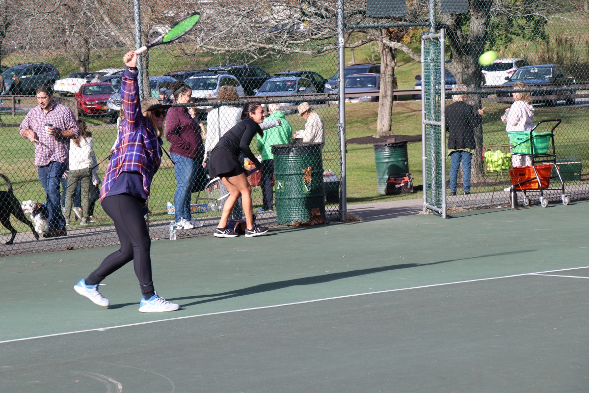 Participant playing tennis.