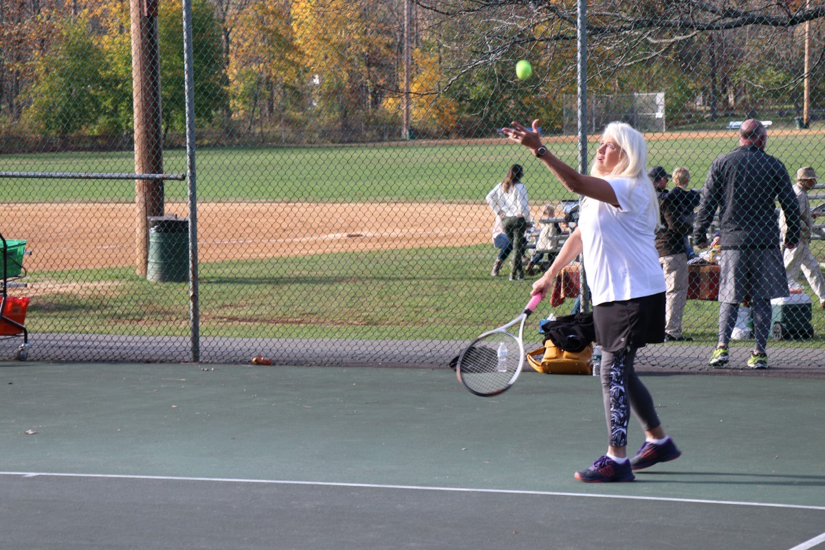 Participant playing tennis.