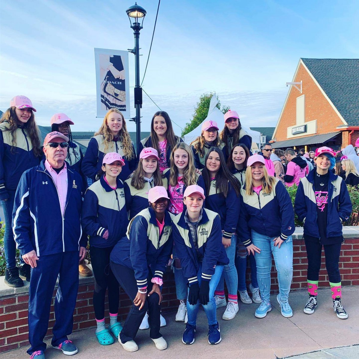 Team poses for a photo at annual Breast Cancer Walk.