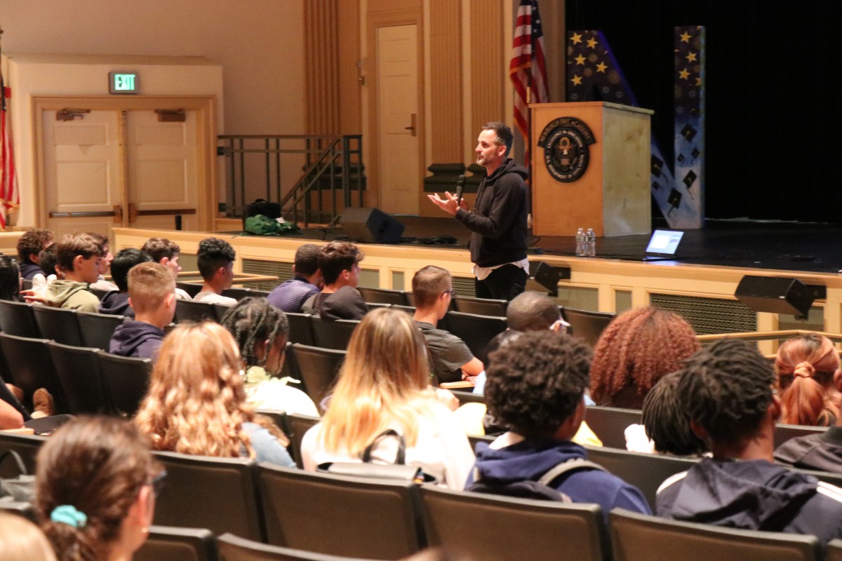 Presenter Cody Hodges addresses the audience.