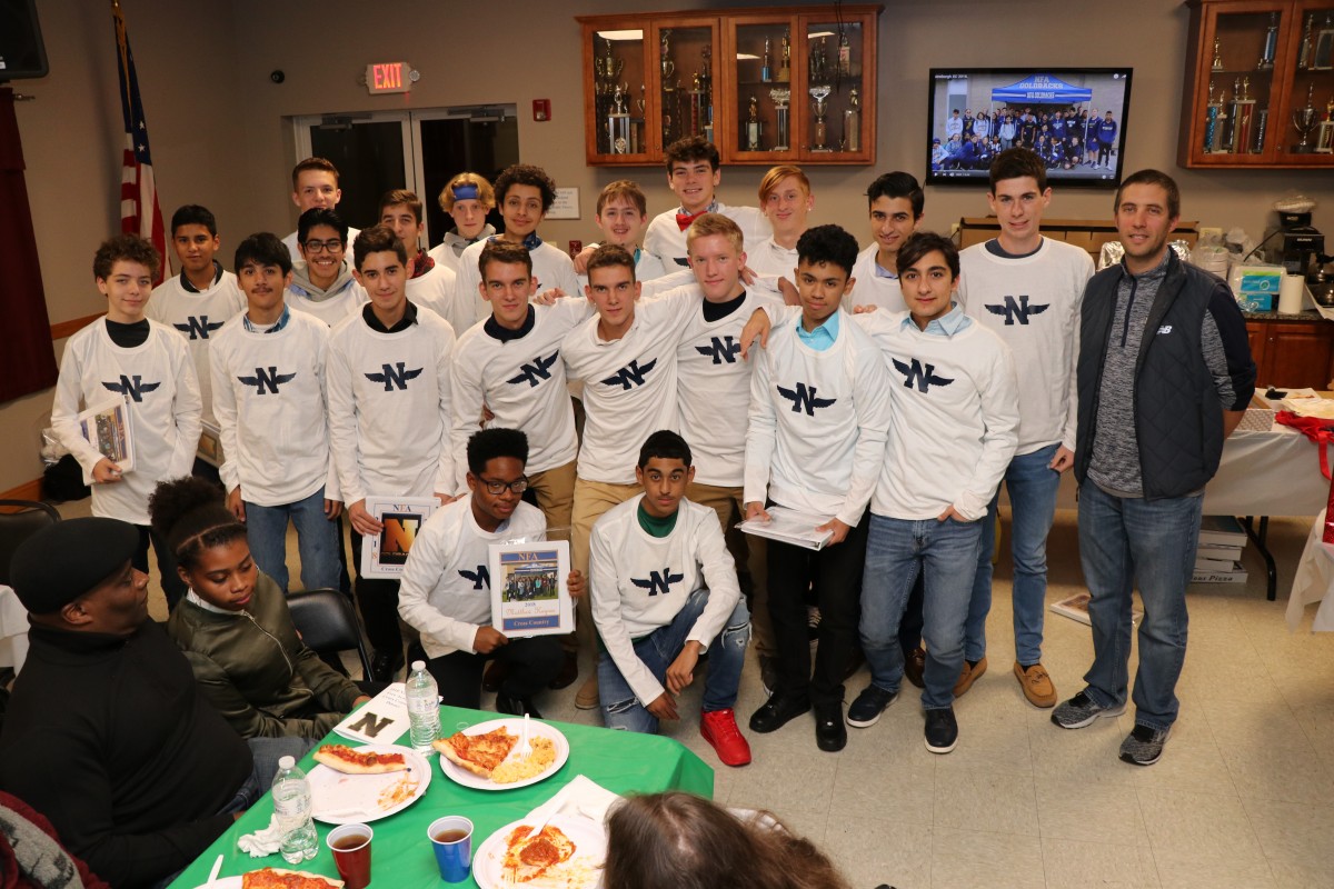 Boy's team poses for a photo